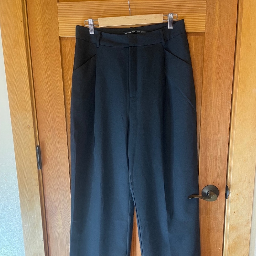 Black pleat front trousers by English Factory
